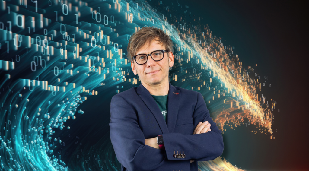 Ein Mann vor einer Welle, die aus Daten besteht.